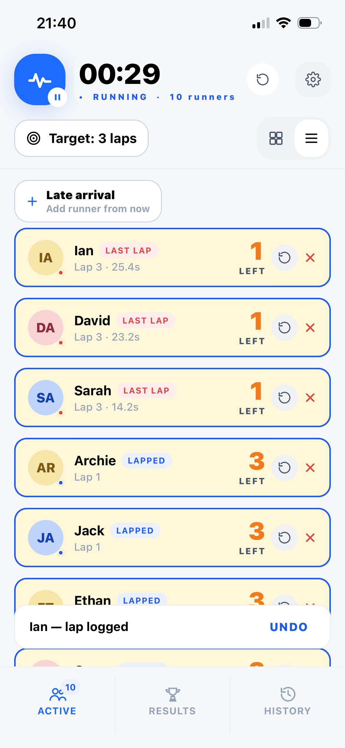 Laply active race screen showing runners and lap counts